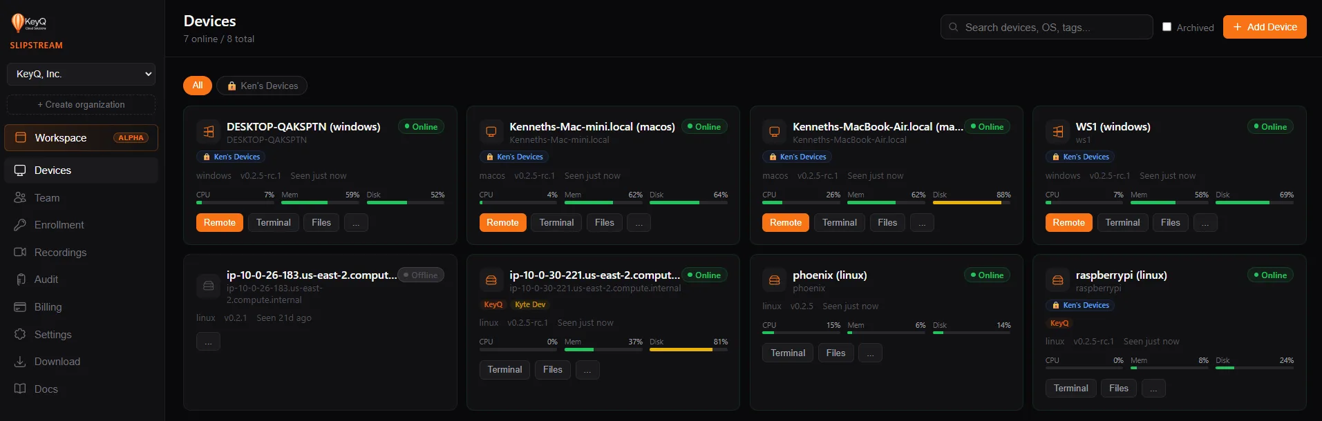 The Slipstream device dashboard: eight machines shown as cards with online status, operating system, agent version, tags, and live CPU, memory, and disk usage.